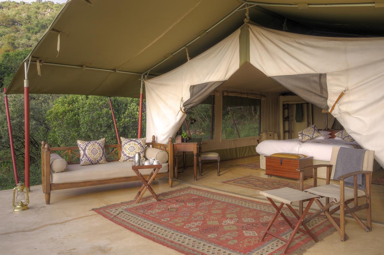 Отель Entumoto Main Camp Ololaimutiek Экстерьер фото